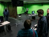 A student demonstrates a virtual reality experience.