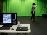 A student demonstrates a virtual reality experience.