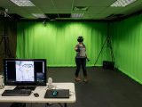 A student demonstrates a virtual reality experience.