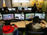 Student play video games developed by their classmates.