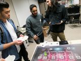 Student play board games developed by their classmates.