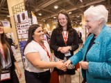 A team from the Sprott School of Business meets a judge.