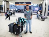 Carleton International student Rajarshi Bose is greeted at the Ottawa International Airport in Sept. 2016