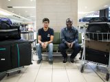 Carleton International students Ruhaan Dev Tyagi (left) and Tolulope Akinbulire (right) are greeted at the Ottawa International Airport in Sept. 2016