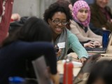 Several young women chatting during the Technovation Challenge.