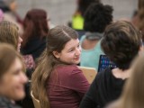 Several young women listen to a presentation during the Technovation Challenge.