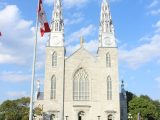 The visiting Indian students pose together outside of Ottawa's Notre-Dame Cathedral Basilica.