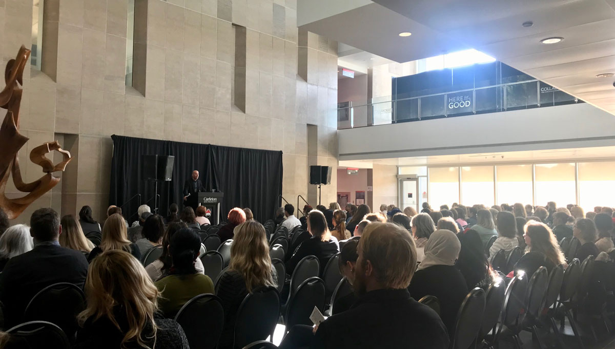 President Benoit-Antoine Bacon speaks at the Psychology Mental Health Day.