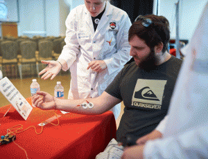 Carleton Neuroscience students provide a demonstration.