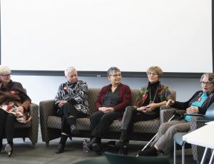 Women participate in a panel discussion on Carleton unionization
