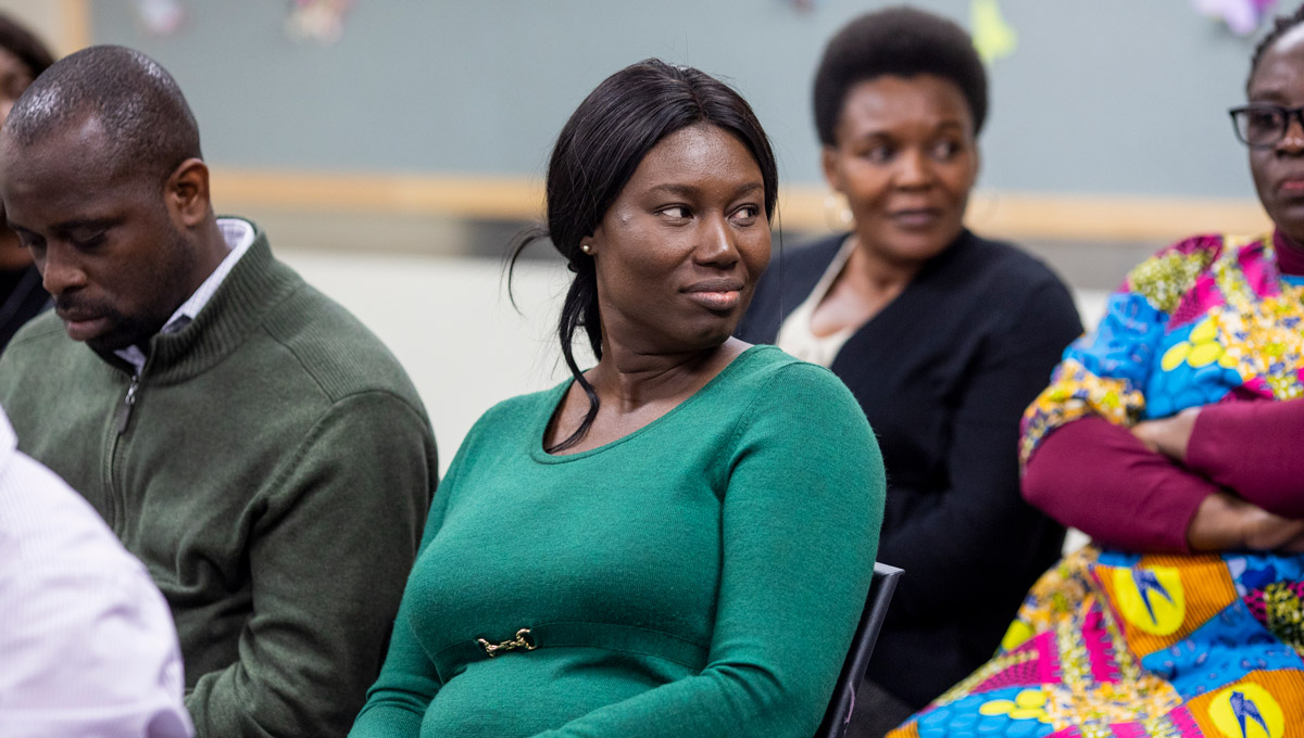 An audience member listens to the presenter Carleton Climate Conversations.