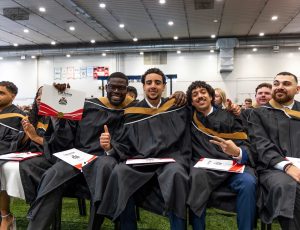 Graduating students at a convocation ceremony.