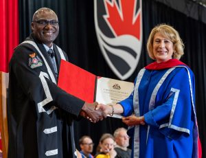 Mona Nemer receives her honorary degree.