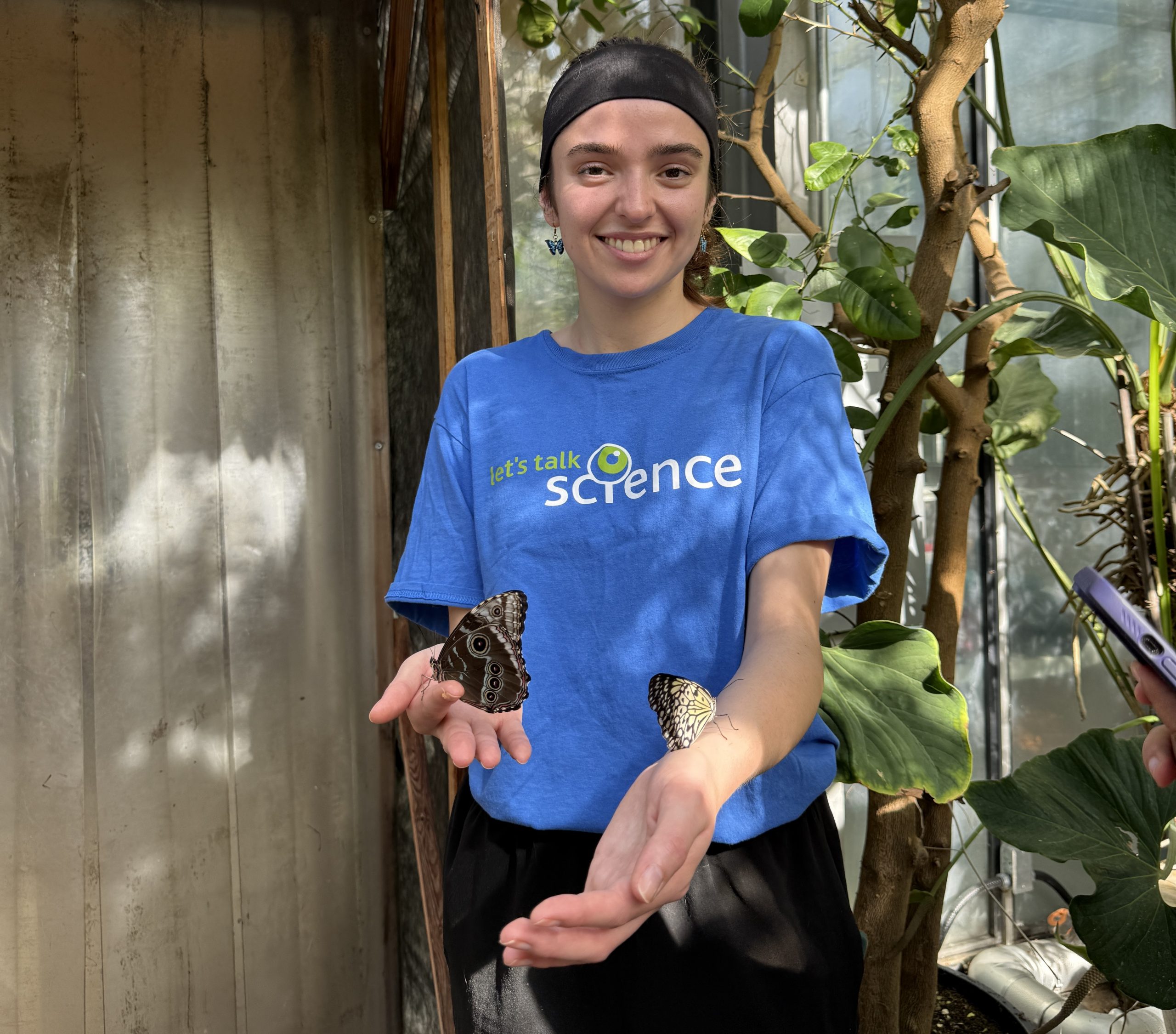 Carleton student Amy Bachhuber at the 26th annual Biology Butterfly Show.