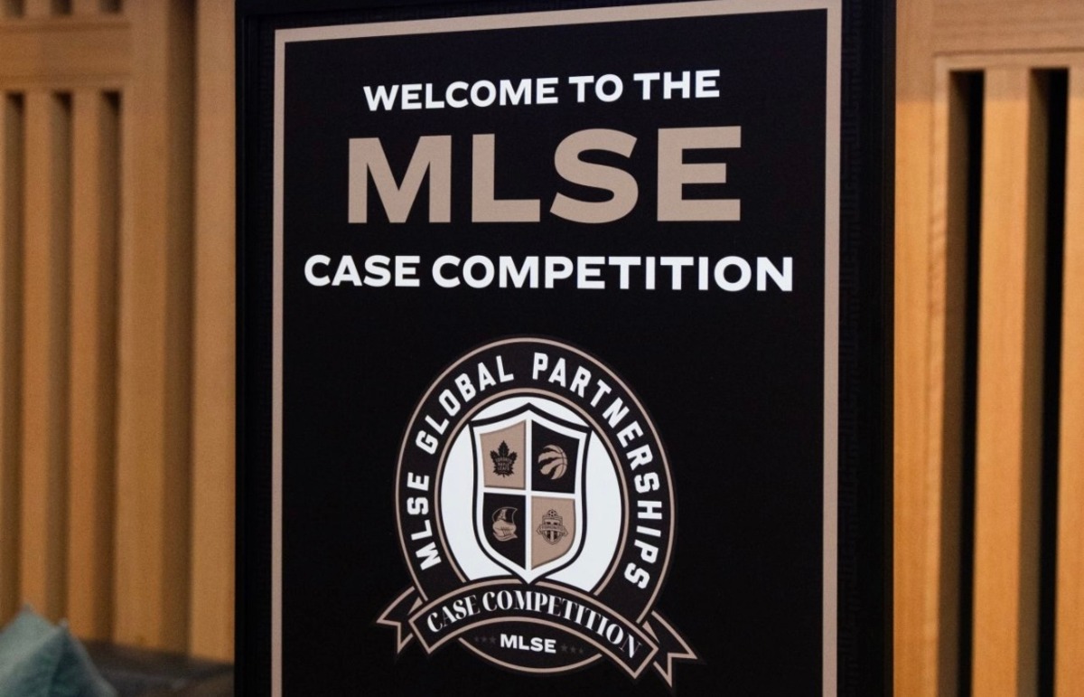 A competition sign reads: “Welcome to the MLSE Case Competition.” The competition’s logo is also shown which includes the same quoted text. 