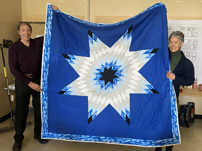 Photo for the news post: Muskowekwan First Nation Honours Three ASAU Professors with Star Blankets