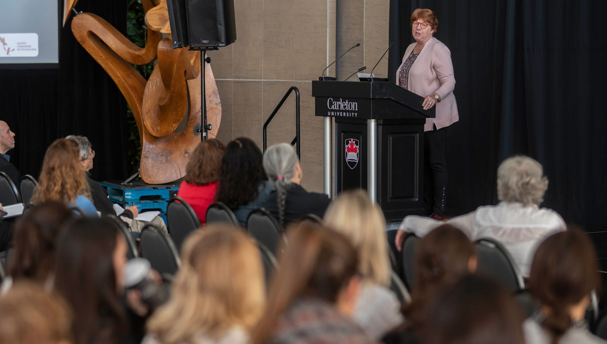 Pauline Rankin addresses attendees at Psychology Mental Health Day.