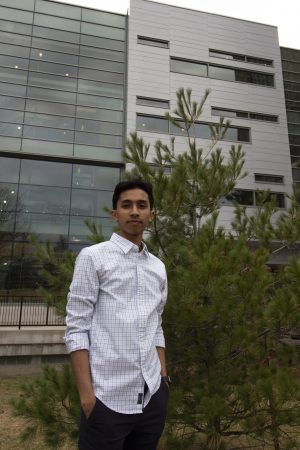 Sami Islam in front of MacOdrum Library