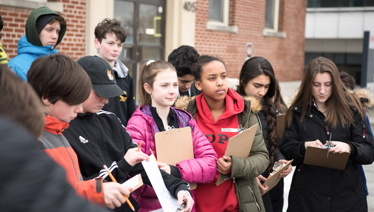 Students recording their thoughts and ideas for their redesign at the Booth Street complex.