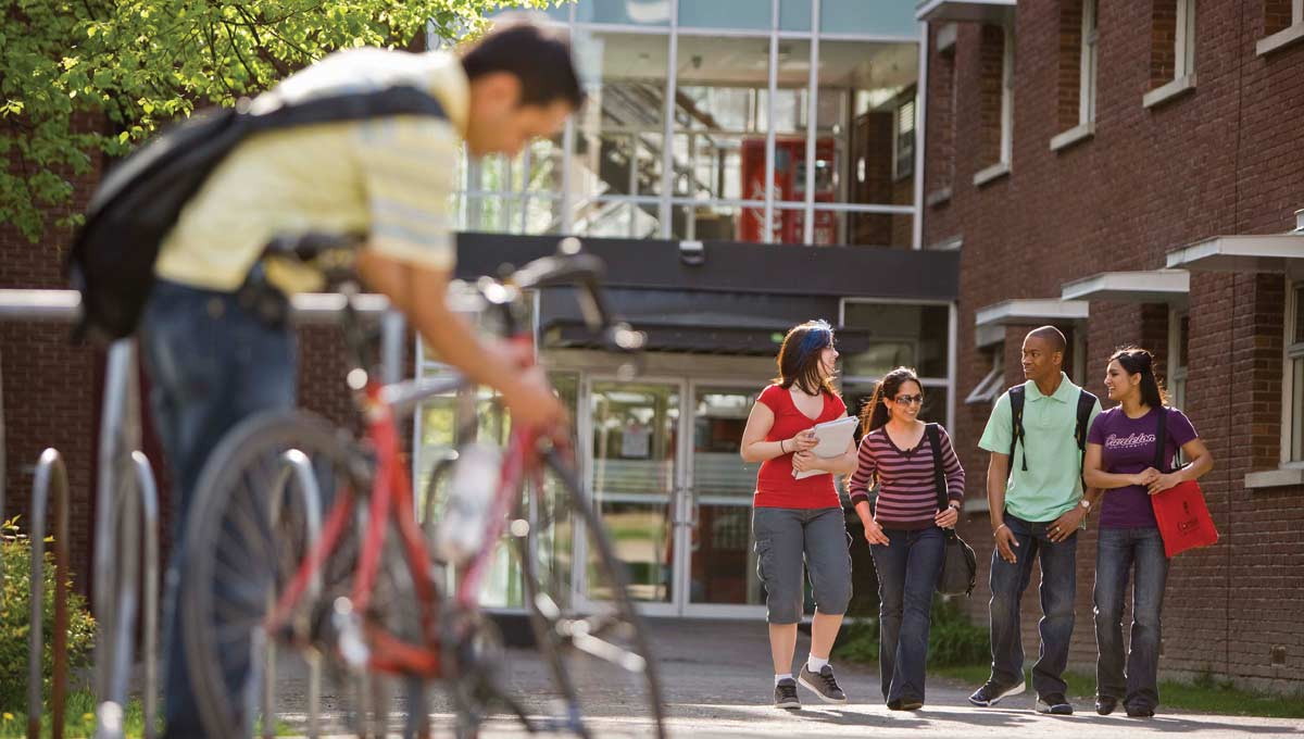 Students, who will benefit from new Carleton programs in 2016 - '17, walk together in the Residence Quad.