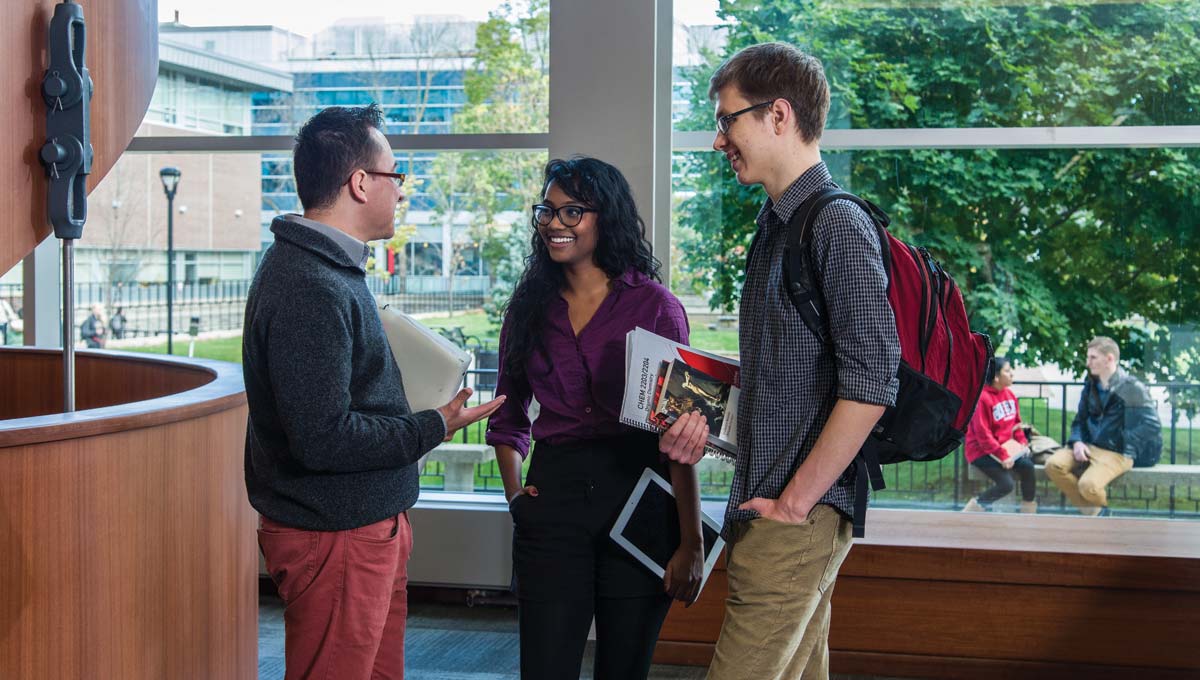 Students, who will benefit from new Carleton programs in 2016 - '17, meet up together in the Library.