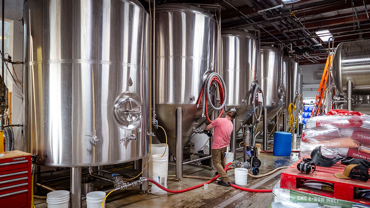 The inside of a large brewing factory.