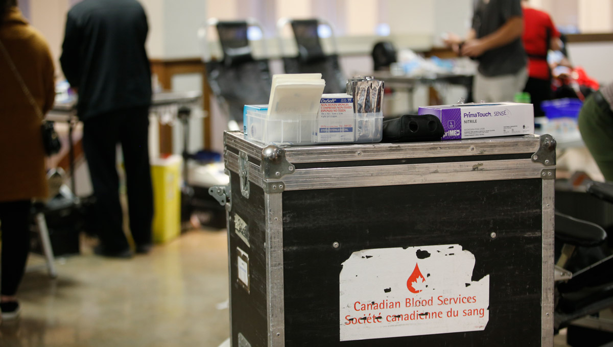 A sign advertises the blood drive. The Ravens men’s football team helped collect an impressive 78 pints of blood on Nov. 30, 2018 at their Give Life blood donation clinic on Carleton University’s campus.