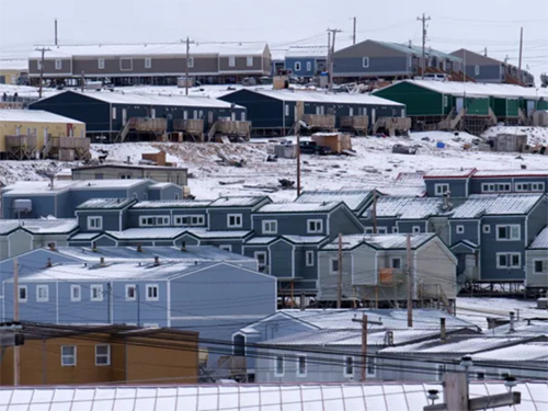 A small community of homes in the winter.