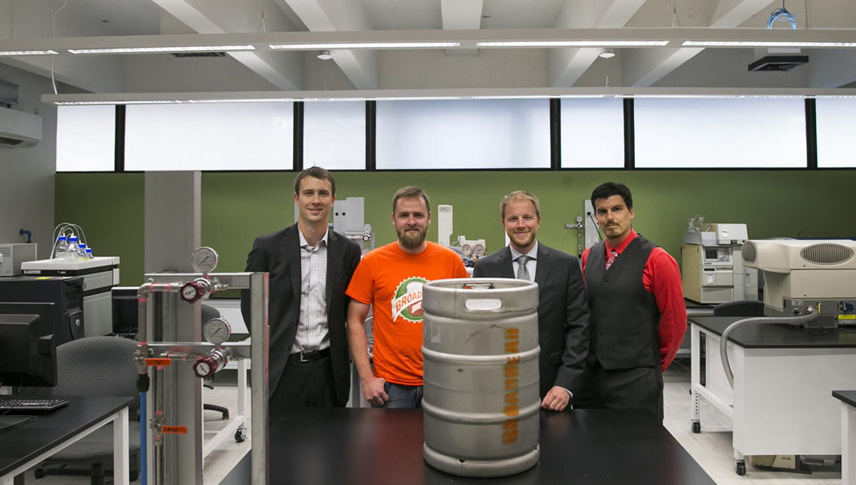 Jeff Smith (third from right) with colleagues and a local brewery client in the Carleton Mass Spectrometry Centre.