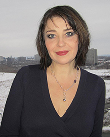 A professional headshot of EURUS Director Crina Viju-Miljusevic