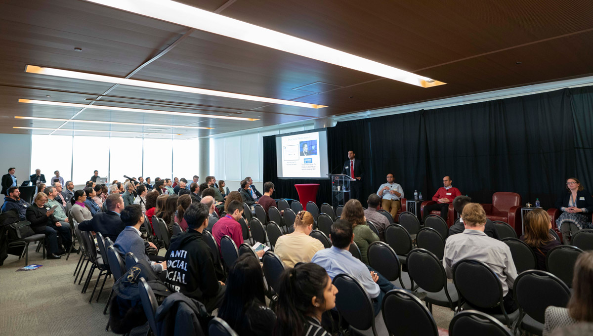 Data Day 6.0 participants and attendees listen to a panel discussion at Richcraft Hall.