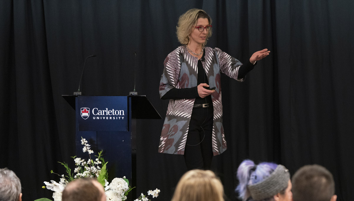 Francesca Casadio gestures on stage.