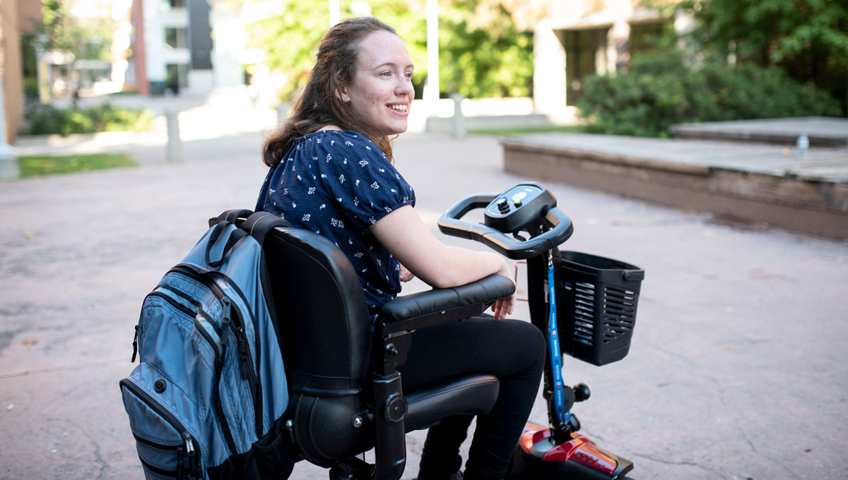 Hannah MacLellan commutes around Carleton's campus. Hannah has accomplished a lot at the age of 19 and she’s just getting started in her life-long quest for disability rights.