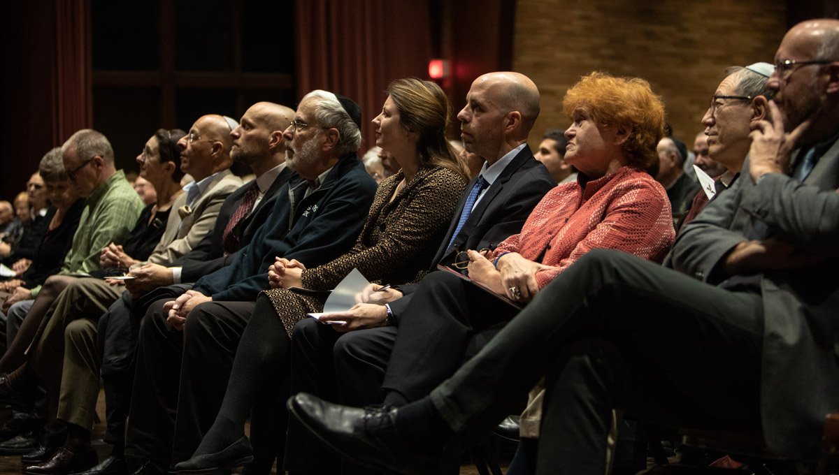 Historian Deborah Lipstadt sits next to Carleton President Benoit-Antoine Bacon and other members of the audience.