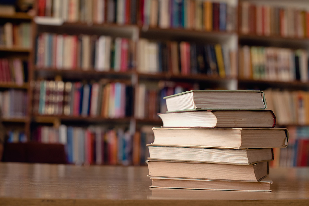 Stacked books in a library.