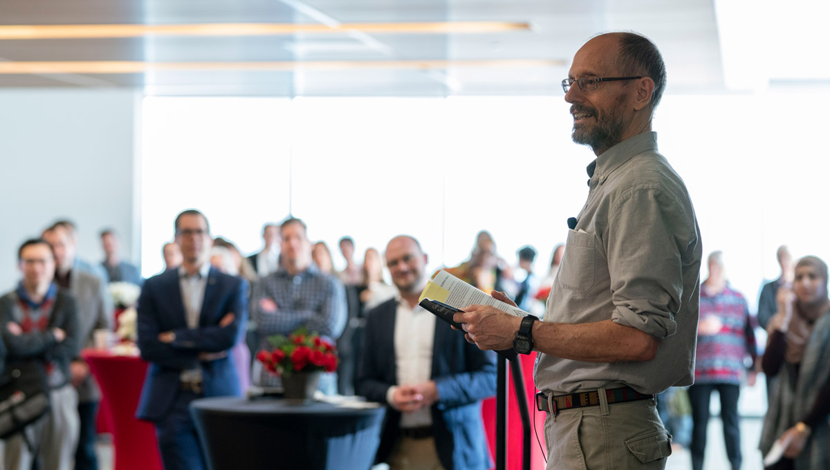 Carleton's John Chinneck speaks at an event launching Teaching and Learning Services' collection of 67 short stories from Carleton’s faculty members and staff in February 2019.