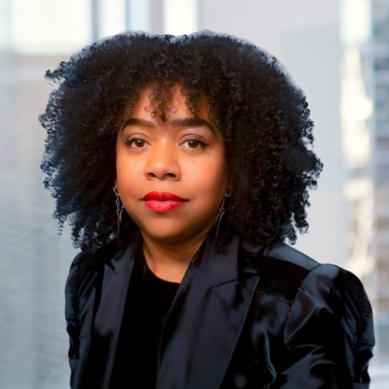 A profesional headshot of a young woman, author of children's books.