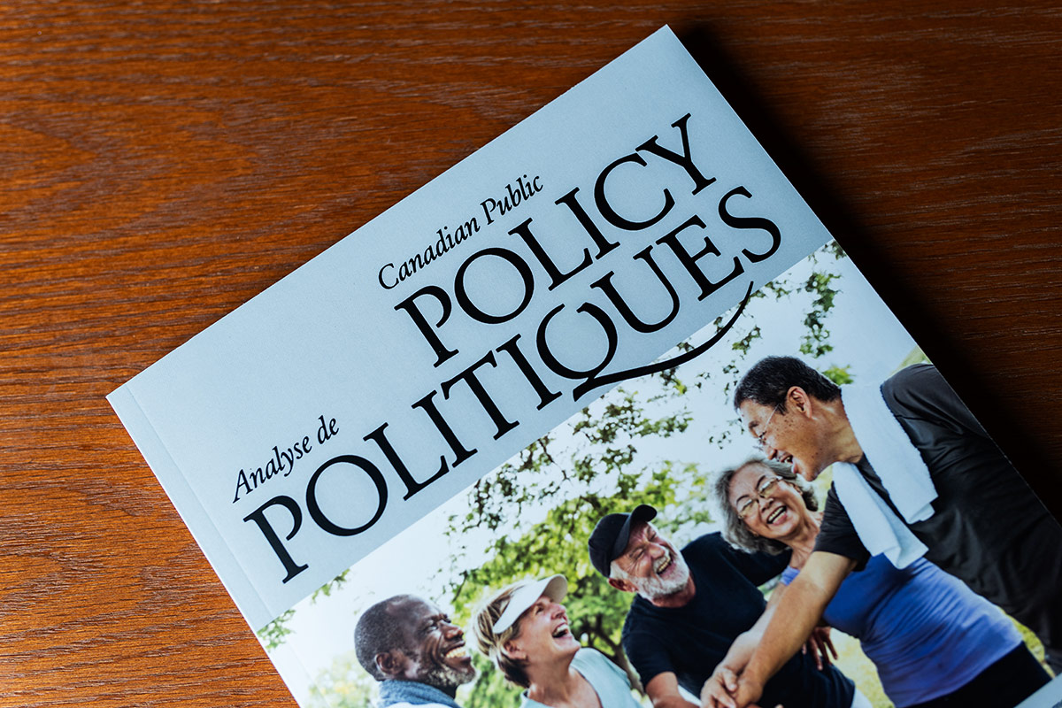 A cover of a book with the title Policy Politiques