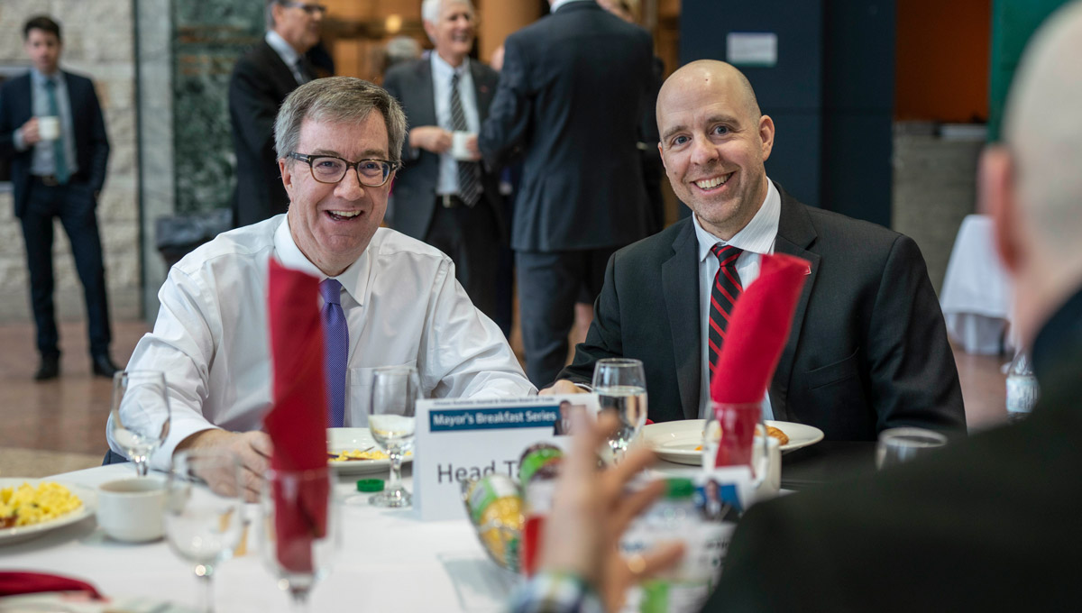 President Benoit-Antoine Bacon has breakfast with Jim Watson before his speech at the Mayor’s Breakfast Series at Ottawa City Hall on Feb. 12, 2019.