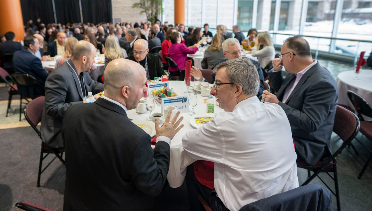 President Benoit-Antoine Bacon has breakfast with Jim Watson before his speech at the Mayor’s Breakfast Series at Ottawa City Hall on Feb. 12, 2019.