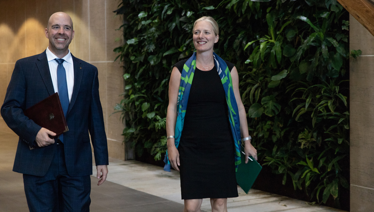 President Benoit-Antoine Bacon arrives with Environment Minister Catherine McKenna.
