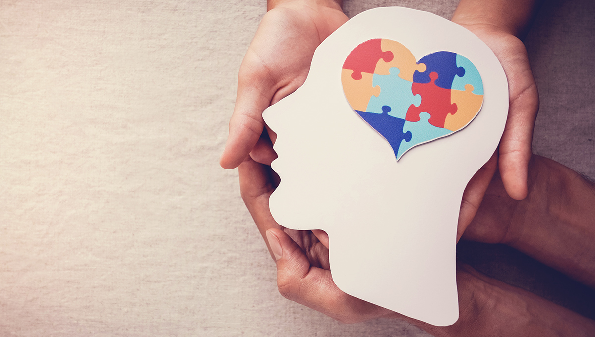 Puzzle jigsaw heart on brain, mental health concept