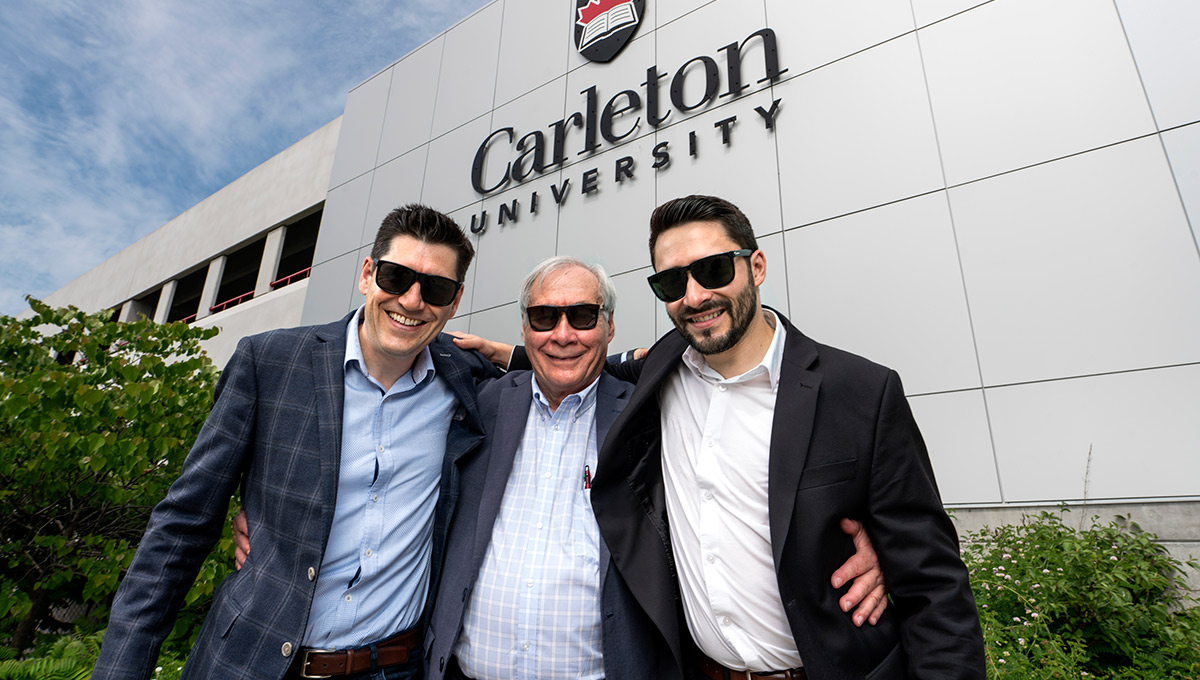 Photo of Prof. Tony Bailetti (middle) with his sons Eduardo and Marco, all wearing sunglasses