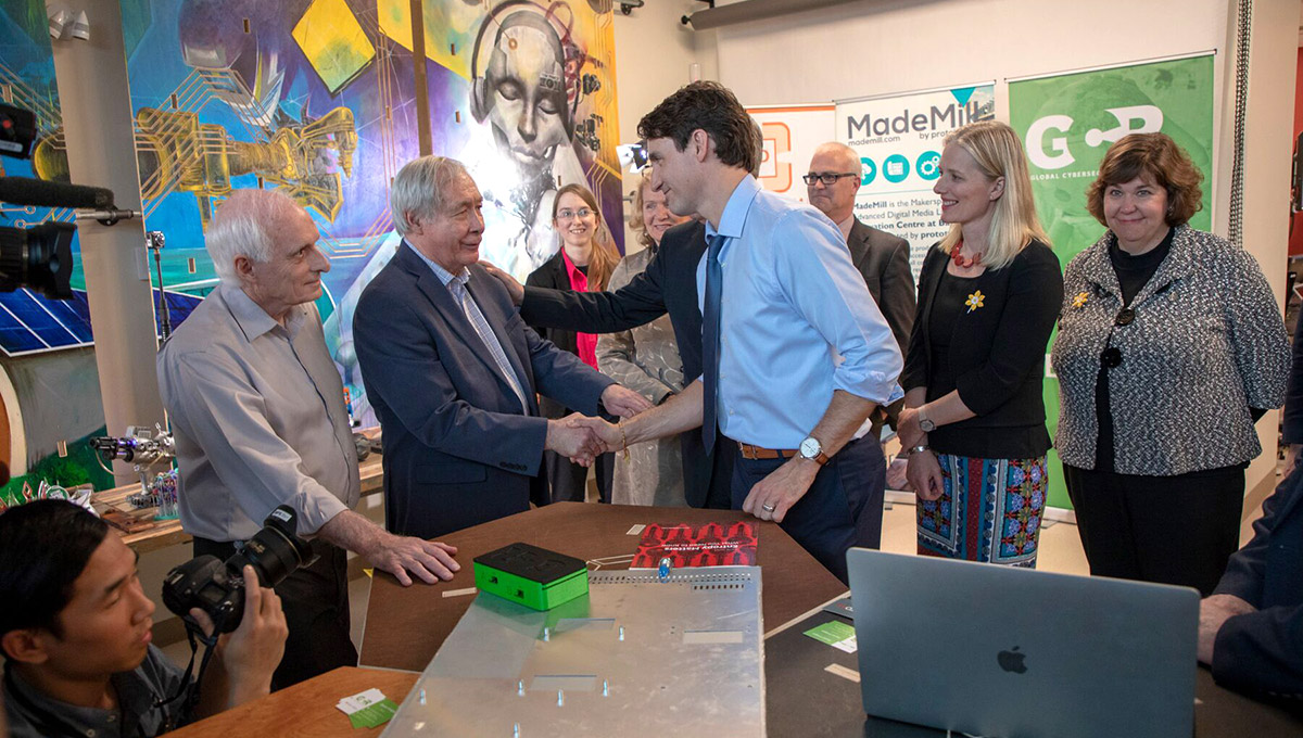 Photo of Prof. Tony Bailetti shaking hands with Prime Minister Justin Trudeau