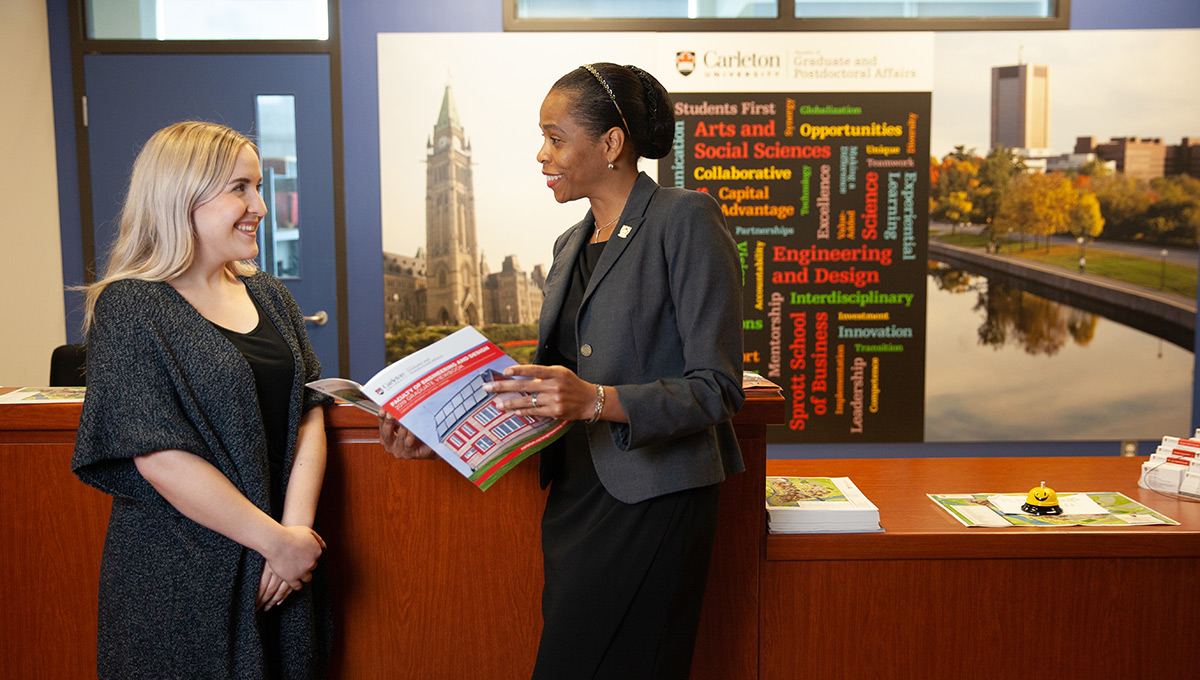 Patrice Smith, Dean of the Faculty of Graduate and Postdoctoral Affairs, speaks with a colleague.