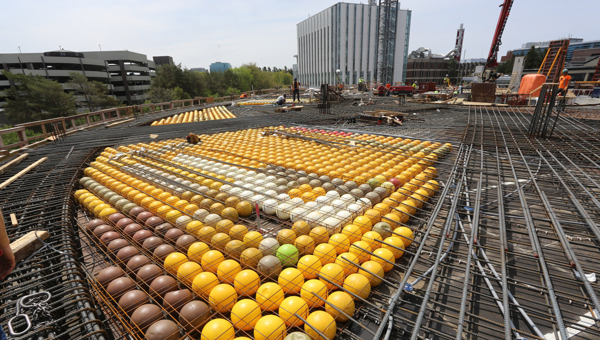 The new Sprott building will feature a void concrete slab system, manufactured by BubbleDeck North America LLC. This innovative approach significantly reduces the weight of the building and promotes sustainability by replacing typical cast-in place concrete slabs with frames of recycled plastic bubbles over which concrete is poured.