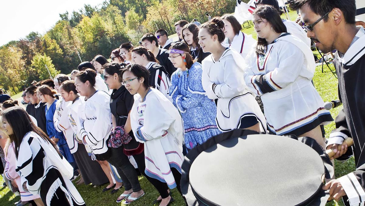 Truth and Reconciliation: Indigenous Students in traditional clothing