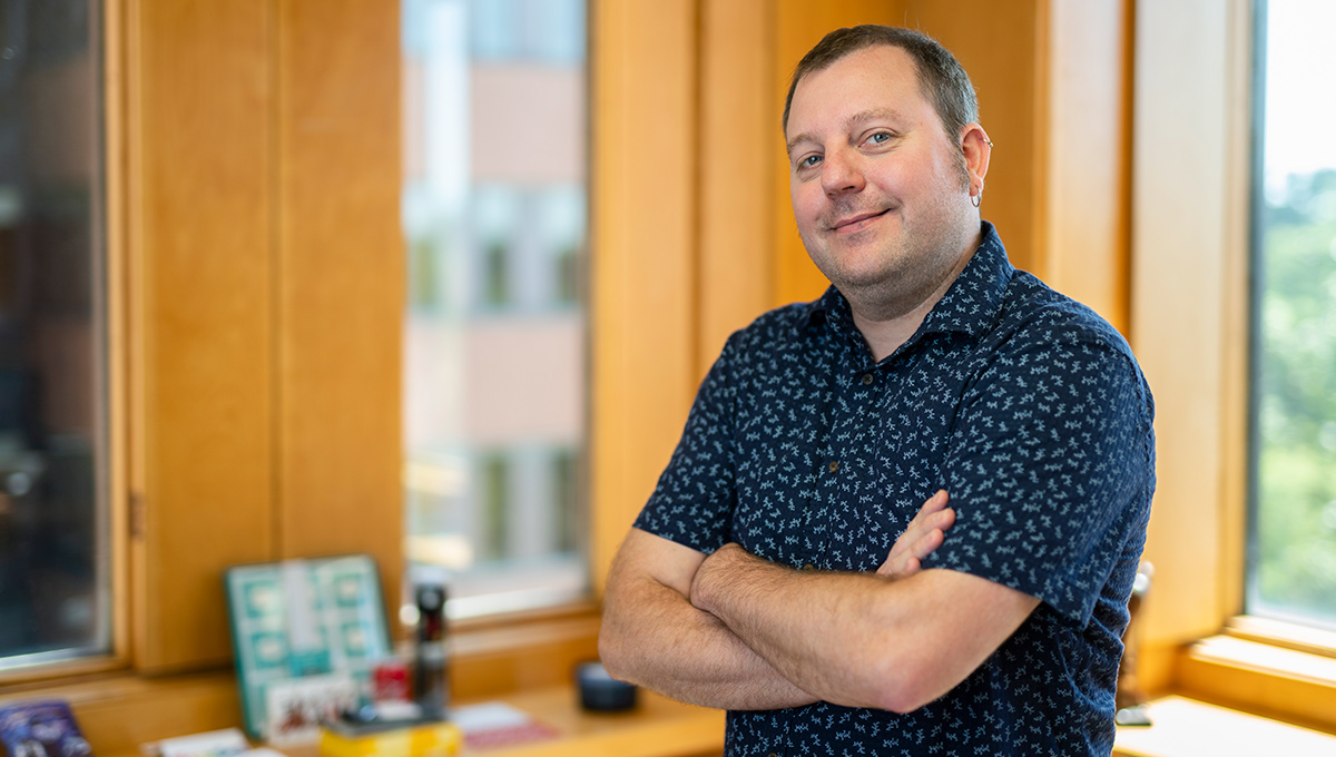 Prof. John Zelenski poses in his office.