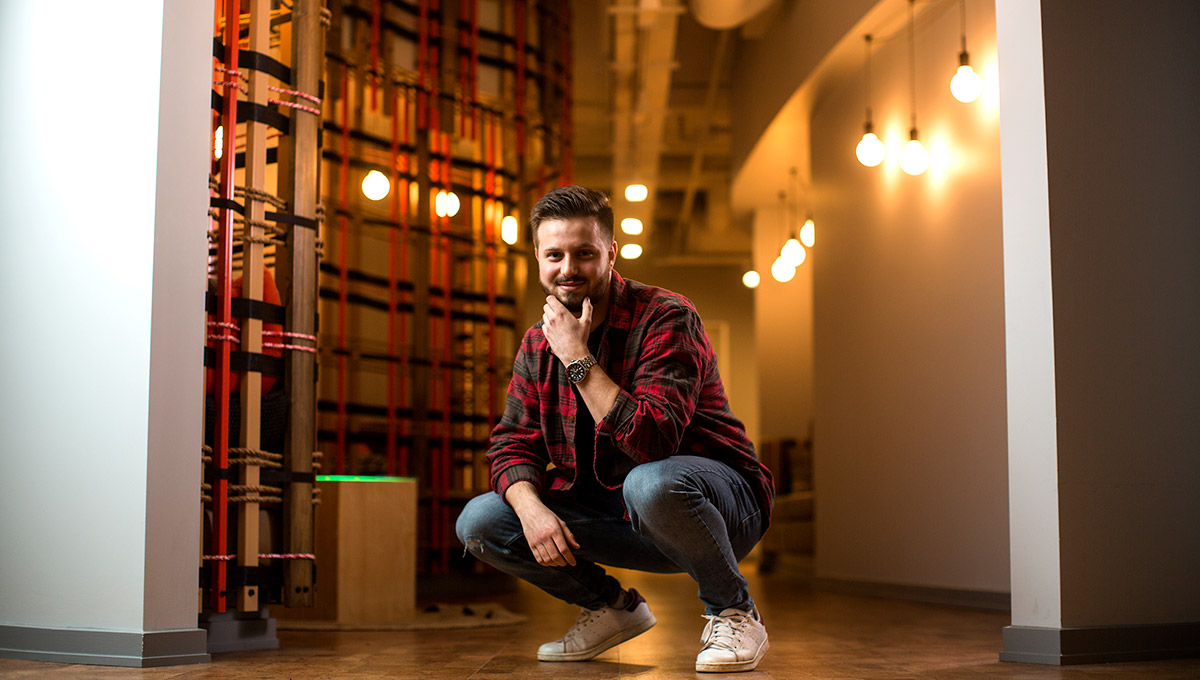 Owen Craston (pictured here), one of the students in Carleton's Dev Degree partnership with Shopify, splits his time between campus & the company’s headquarters, earning valuable career experience.