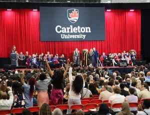 A look at the stage and audience at Spring Convocation 2024 at Carleton University